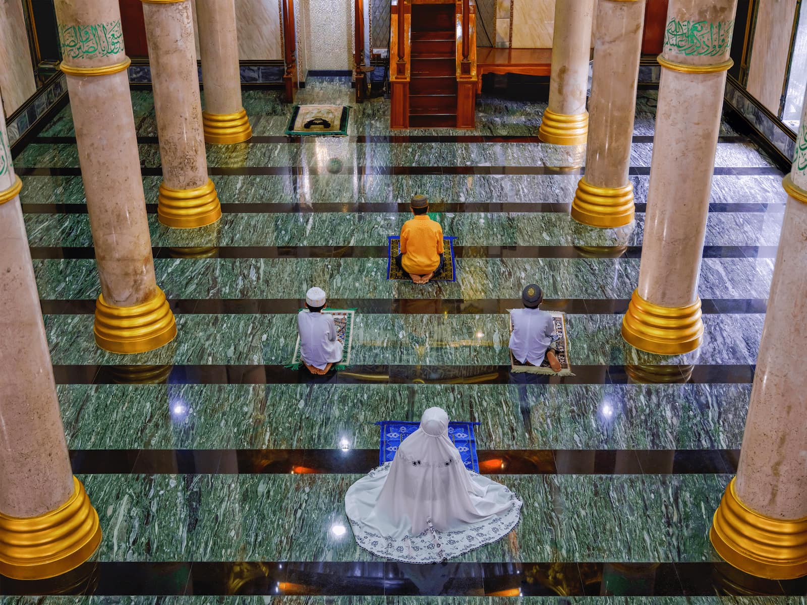 Calm mosque architecture scene with domes and geometric arches